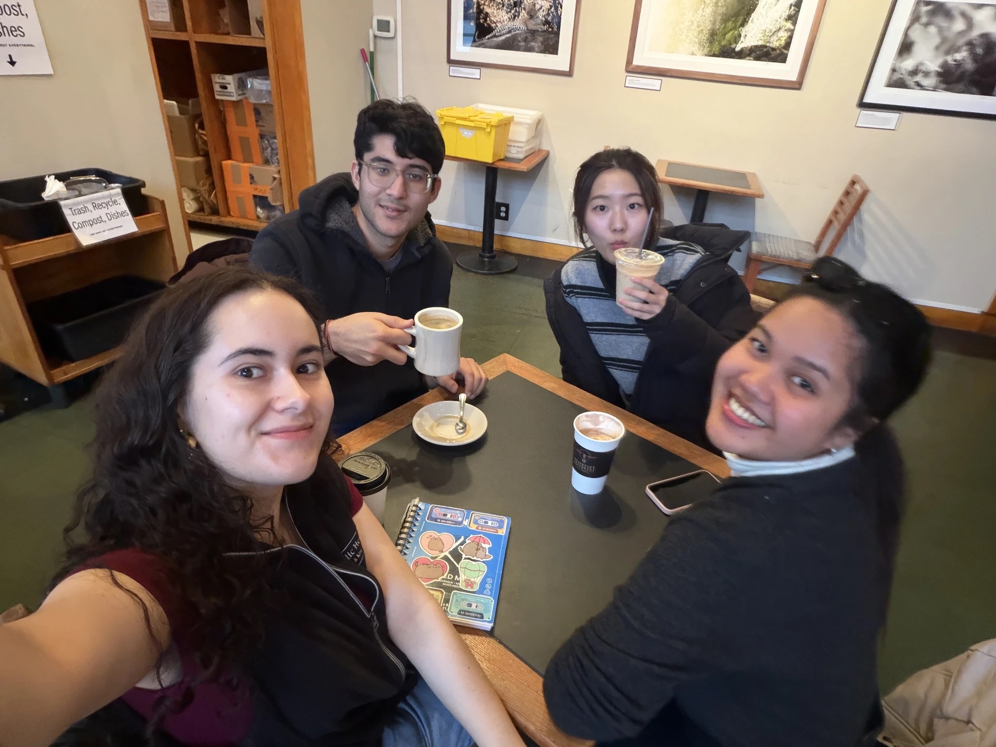 Project team around a table: Rakshit, Meera, Gracia, and June